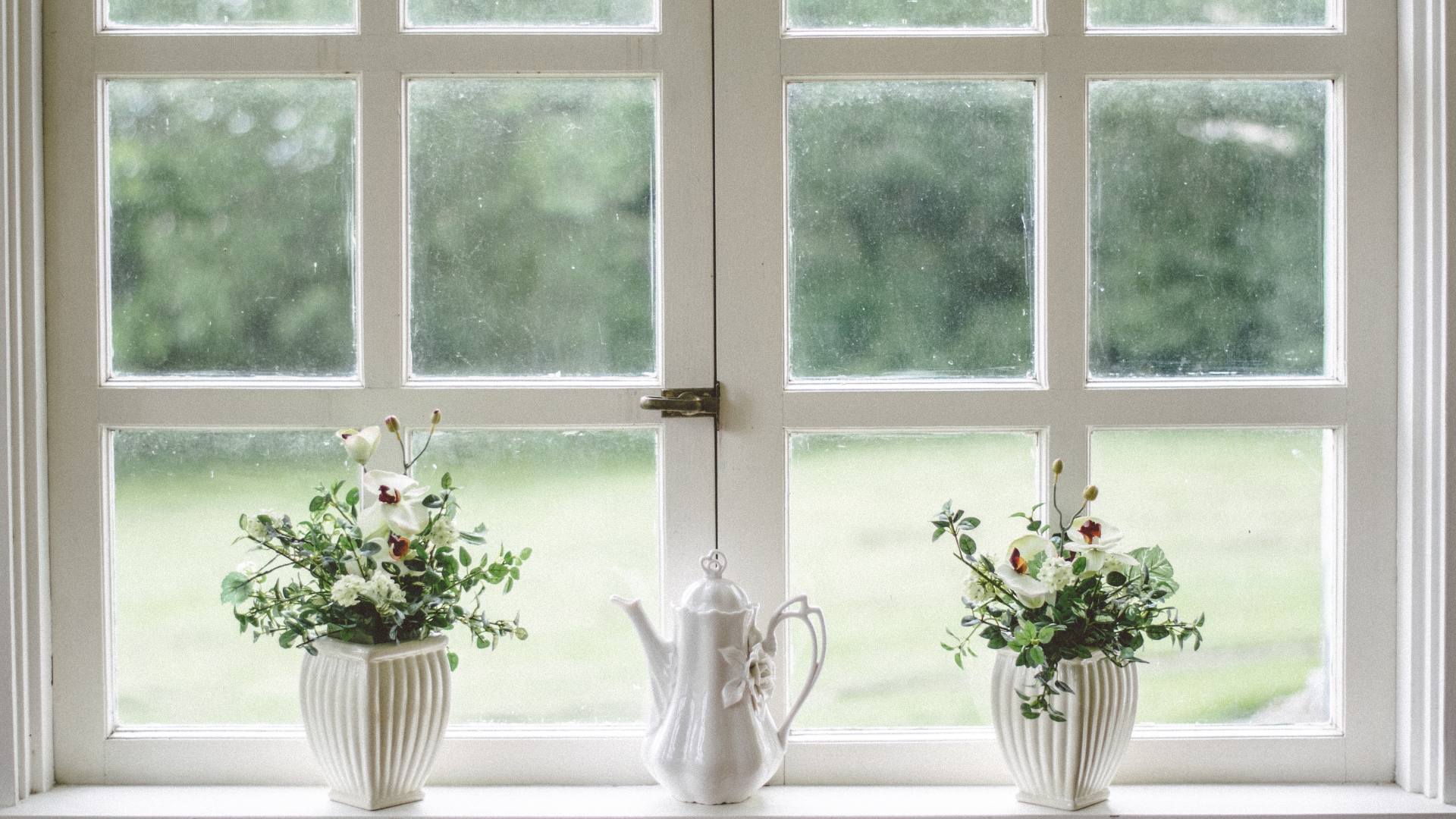 Large residential windows with a bright interior view