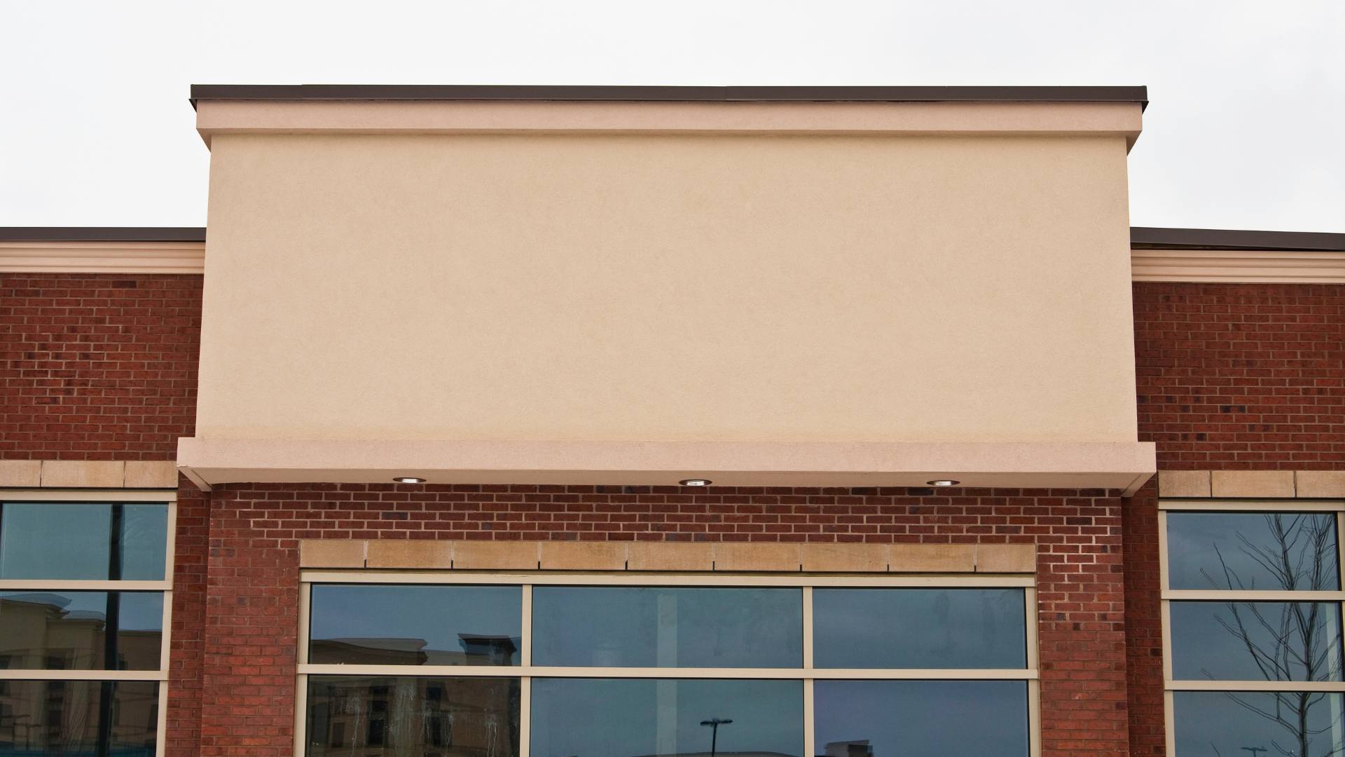 Retail storefront with glass display windows and awning